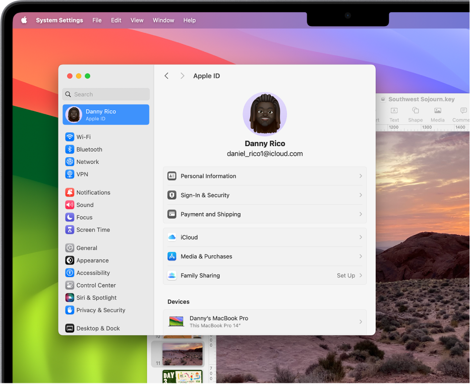 Un bureau Mac avec la fenêtre « Réglages Système » de l’identifiant Apple et un document Keynote qui s’ouvrent.
