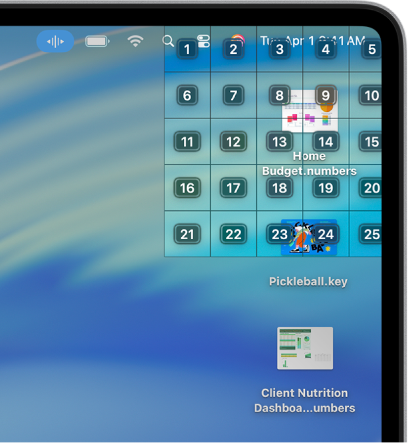 Une grille apparaît dans le coin supérieur droit de l’écran, où se trouvent des documents Numbers et Keynote. Chaque cellule au sein de la grille est identifiée par un numéro.