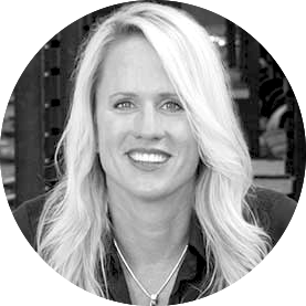 Black and white headshot of Dr. Andrea Hudy