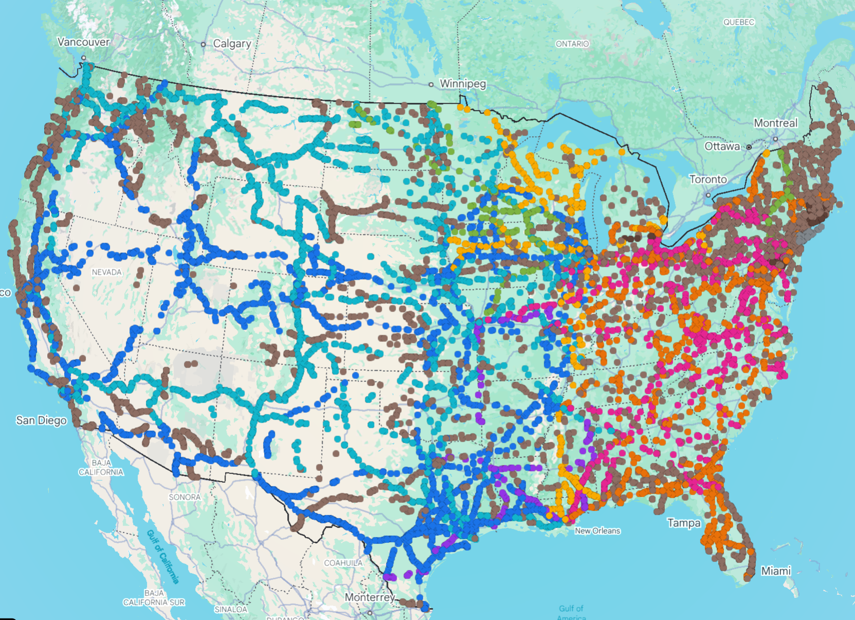 Map of the United States showing a dense network of multi-colored dots and lines representing geographic infrastructure.