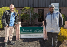 AJ with Program Director Brandonn in front of Devereux sign