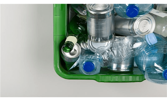 Recyclable packaging containers and bottles in recycle bin